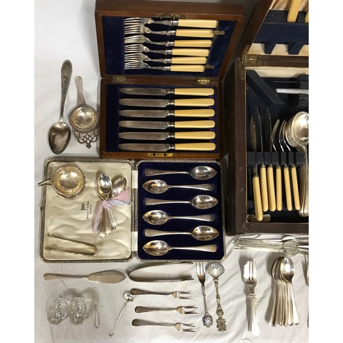 690 - A large quantity of silver plated cutlery to include lobster and walnut picks, some in original boxe... 