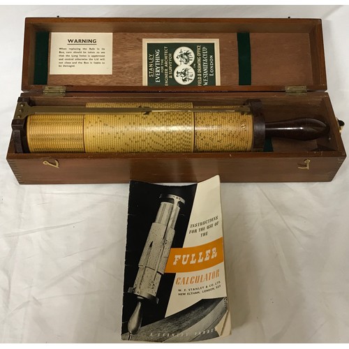 1003 - A vintage 1940s Stanley Fuller Cylindrical calculator.