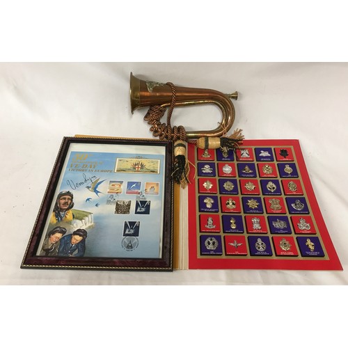 946 - A military brass and copper bugle horn with Argyll and Sutherland brass badge, cord and tassels, tog... 