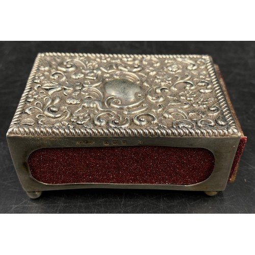 707 - An embossed hallmarked silver match box holder. Birmingham 1906 maker Cornelius Desormeaux Saunders ... 