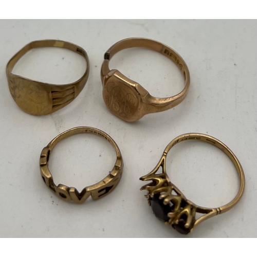 436 - Four nine carat gold rings. Total weight 12.8gm.