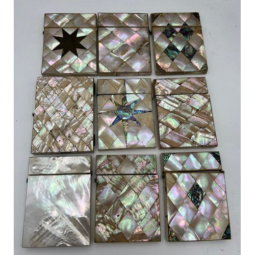 1007 - Nine mother of pearl visiting card cases.