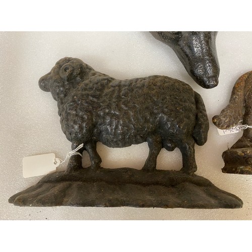 1008 - Three 19thc cast iron door stops in the form of sheep 25.5cm l, x 18cm h, fox's head 14.5cm h x appr... 