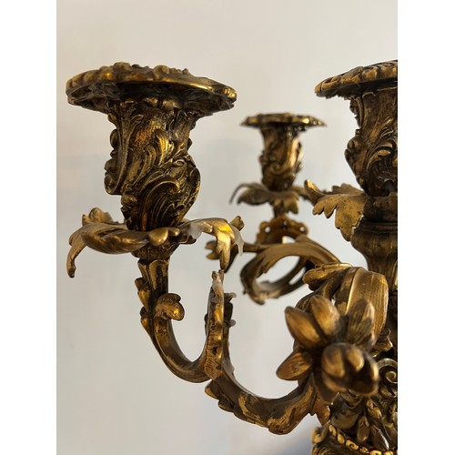 1019 - Fine quality five sconce ormolu candelabra. 57cm h.