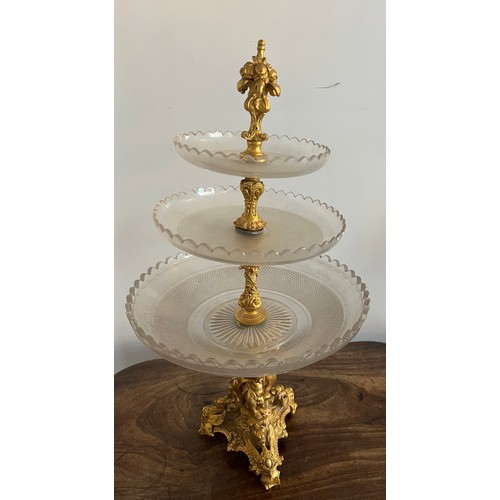 1020 - A 19thC ormolu and glass three tier tazza. 55cm h.