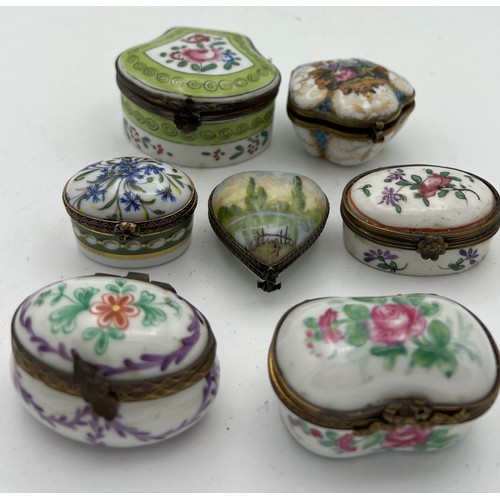 1038 - Seven various continental 19thC porcelain boxes, largest 6x6cm. 













Ffff