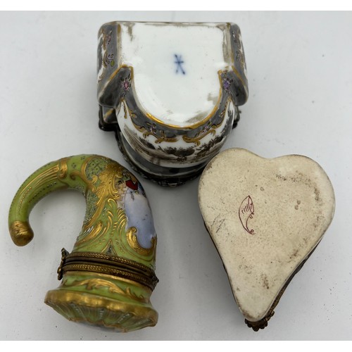 1039 - Two continental porcelain trinket boxes and a cornucopia. 8.5cm approx.