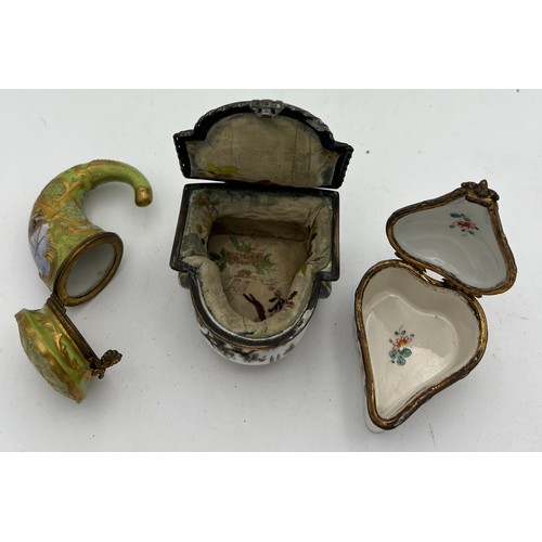 1039 - Two continental porcelain trinket boxes and a cornucopia. 8.5cm approx.