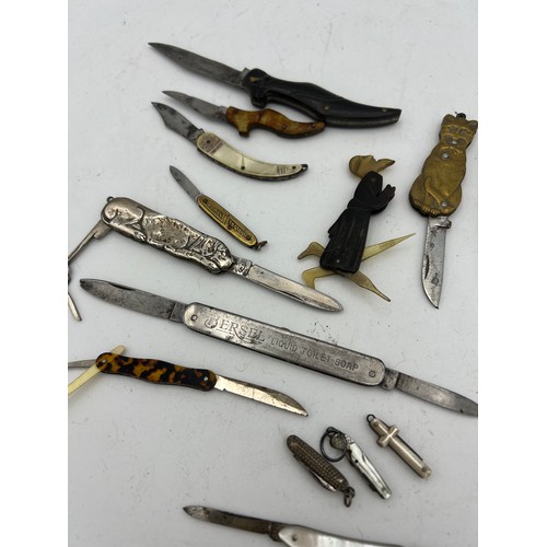 1045 - Fifteen various mainly 19thC penknives to include novelty, miniature and advertising. Depicting dog,... 