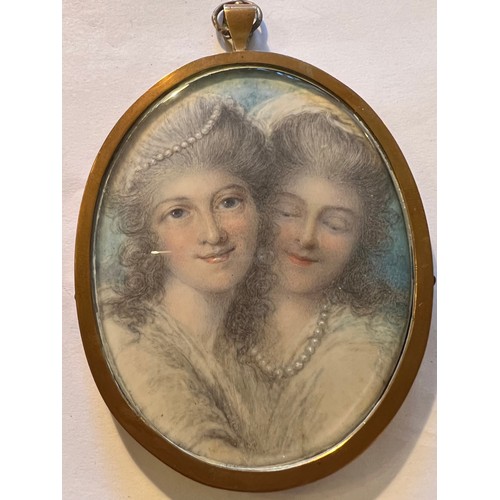 1057 - A portrait miniature on ivory of two young ladies. Size 8 x 6.5cm. Hair to reverse. Ivory submission...