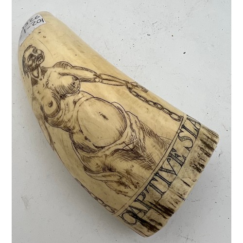 1074 - Mid 19thC scrimshaw whales tooth, finely engraved with Slaver Captain and a Captive Slave. 13cm h.