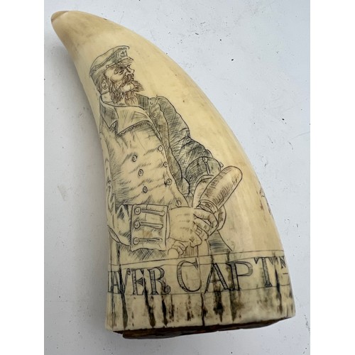 1074 - Mid 19thC scrimshaw whales tooth, finely engraved with Slaver Captain and a Captive Slave. 13cm h.