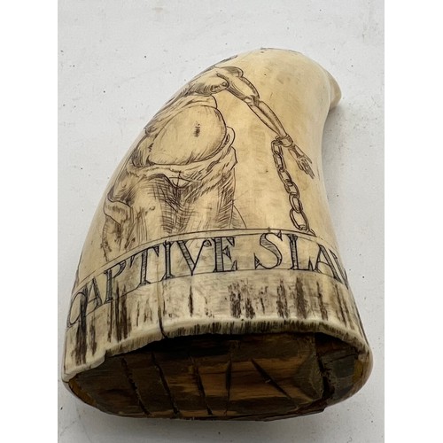 1074 - Mid 19thC scrimshaw whales tooth, finely engraved with Slaver Captain and a Captive Slave. 13cm h.