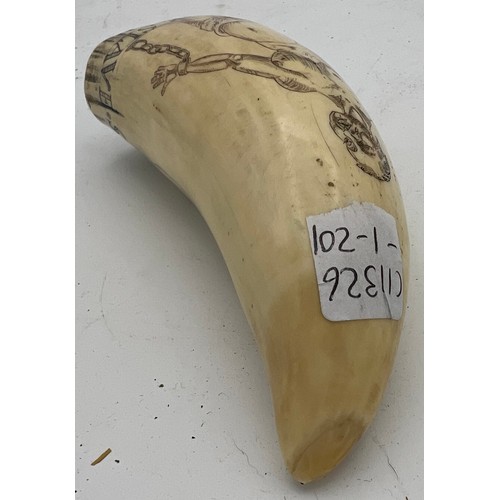 1074 - Mid 19thC scrimshaw whales tooth, finely engraved with Slaver Captain and a Captive Slave. 13cm h.