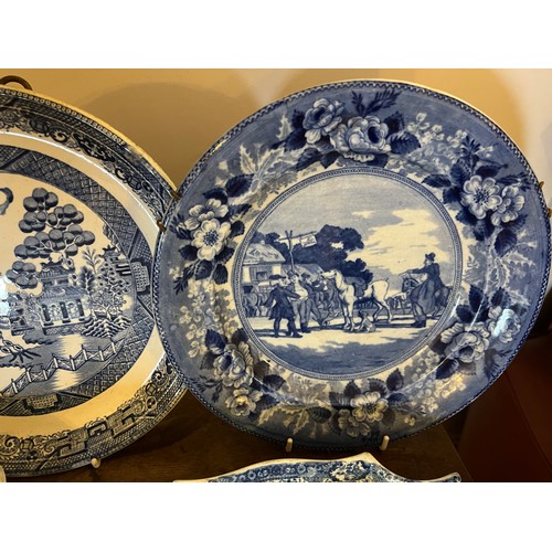 196 - Seven pieces of 19thC blue and white pottery to include two Adams Doctor Syntax plates, pap bowl mar... 