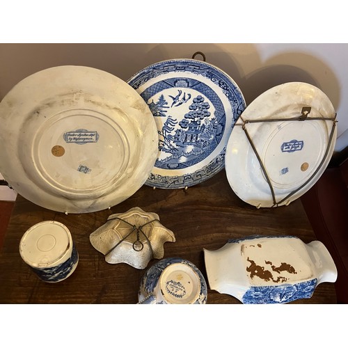 196 - Seven pieces of 19thC blue and white pottery to include two Adams Doctor Syntax plates, pap bowl mar... 