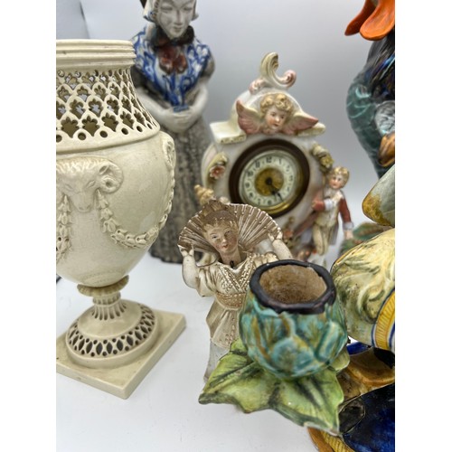 205 - Ceramics to include Leeds pottery vase 20cm h lacking lid, Griffin candleholder, 19thC ceramic clock... 