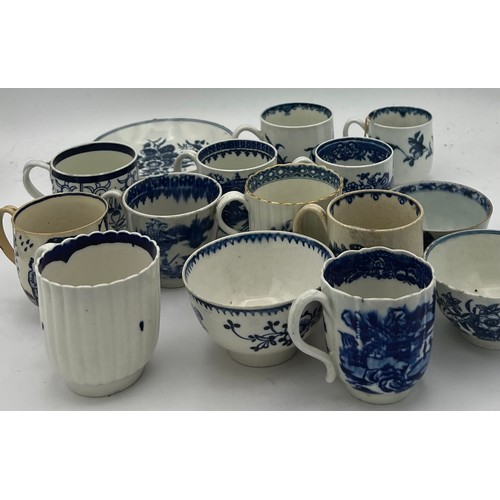 207 - A collection of 18thC blue and white cups, cans and saucers, both pottery and porcelain.