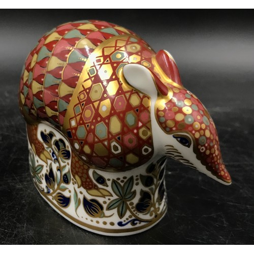 214 - Royal Crown Derby comprising 3 paperweights with gold stoppers: Armadillo, Meercat and  Dragon toget... 