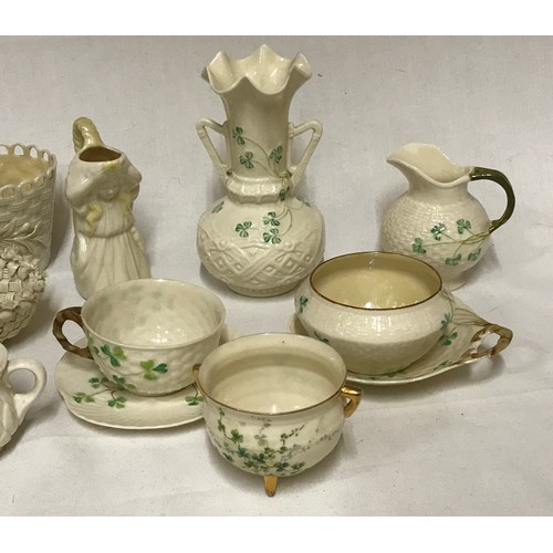 220 - Fourteen pieces of Belleek to include seven pieces decorated with shamrocks and seven other various ... 