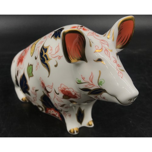 224 - Two Royal Crown Derby boxed paperweights: Sitting Pig with red factory stamp, gold stopper, date cod... 