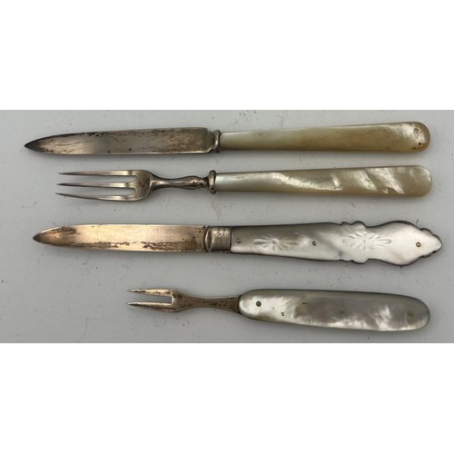 711 - A silver and mother of pearl knife and fork Sheffield 1919, maker William Hutton and sons Ltd togeth... 