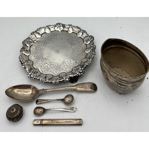 713 - Hallmarked silver to include card tray 17cm d London 1832, sugar bowl, spoons, needle case etc. tota... 