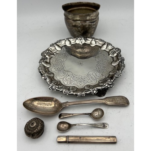 713 - Hallmarked silver to include card tray 17cm d London 1832, sugar bowl, spoons, needle case etc. tota... 