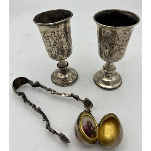 722 - Russian and continental silver to include two miniature goblets 8.5cm h, egg pendant with Virgin Mar... 