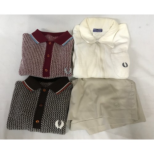 868 - A selection of clothing to include five original Fred Perry items of clothing, two polyester/cotton ... 