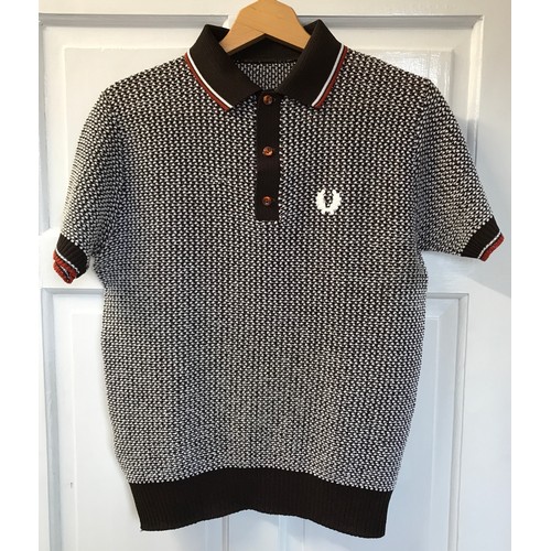 868 - A selection of clothing to include five original Fred Perry items of clothing, two polyester/cotton ... 