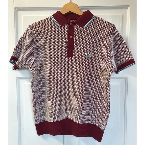 868 - A selection of clothing to include five original Fred Perry items of clothing, two polyester/cotton ... 