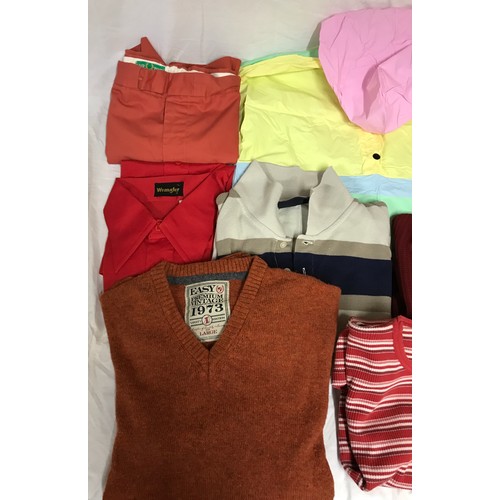 868 - A selection of clothing to include five original Fred Perry items of clothing, two polyester/cotton ... 