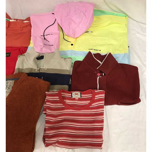 868 - A selection of clothing to include five original Fred Perry items of clothing, two polyester/cotton ... 