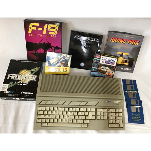 891 - Boxed Atari console with F-19 Stealth Fighter, Psygnosis, Grand Prix, Frontier Elite II, Lombard Ral... 