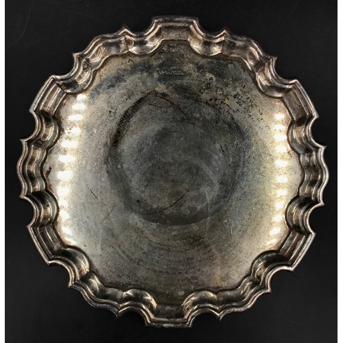 742 - Silver tray 543gms 25cm diameter on three ornate feet, marked 925, maker's mark Carr's of Sheffield ... 