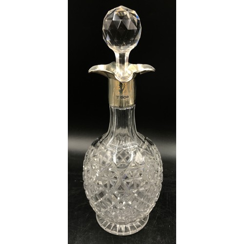 743 - Glass decanter 31cm h with an ornate silver collar Sheffied 1922, maker Hammond, Creake & Co (Saint ... 