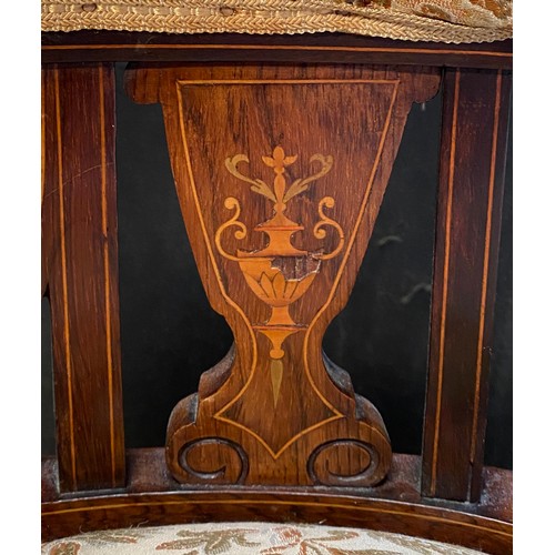 94 - An Edwardian inlaid tub chair on castors. To back 64cm, to seat 38cm, 60cm w.