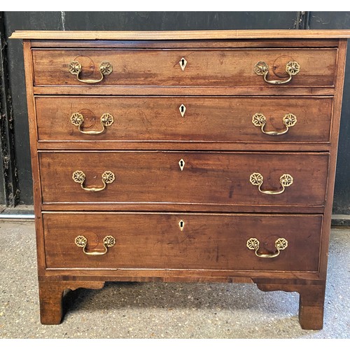 95 - Mahogany chest of 4 long graduating drawers with bone escutcheons. 82.5 h x 85 w x 44.5cm d.