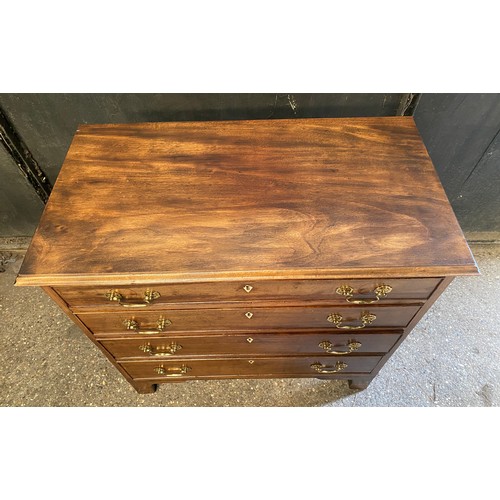 95 - Mahogany chest of 4 long graduating drawers with bone escutcheons. 82.5 h x 85 w x 44.5cm d.