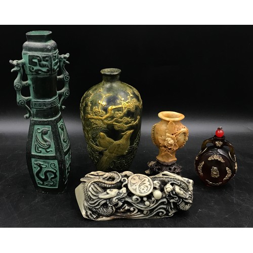 922 - A collection of Oriental items to include two vases one with Chinese writing on the back and brass d... 