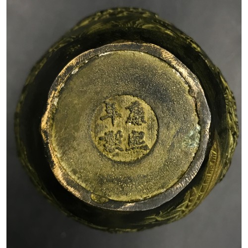 922 - A collection of Oriental items to include two vases one with Chinese writing on the back and brass d... 