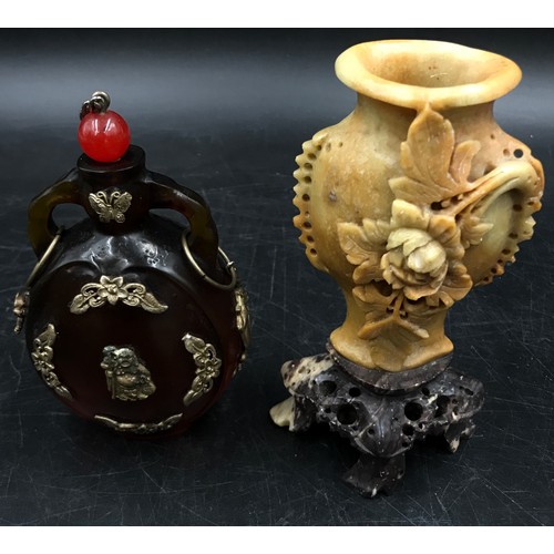 922 - A collection of Oriental items to include two vases one with Chinese writing on the back and brass d... 