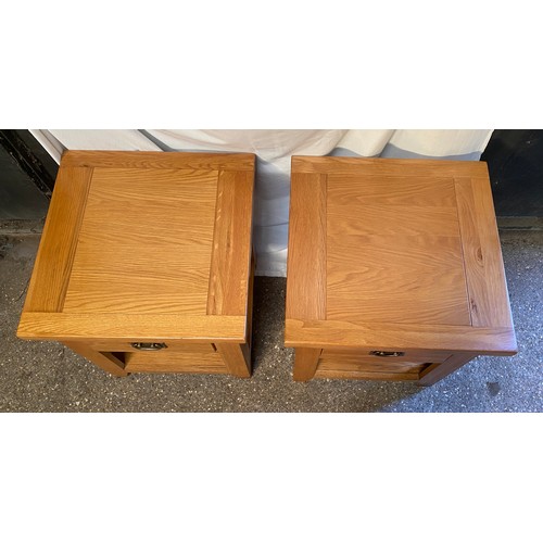 81 - A pair of matching bed side tables  with drawer and shelf. 
61 h x 55 w x 55cm d.