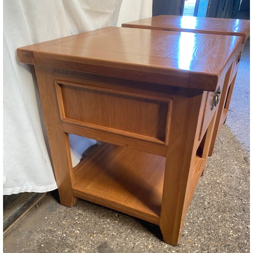 81 - A pair of matching bed side tables  with drawer and shelf. 
61 h x 55 w x 55cm d.