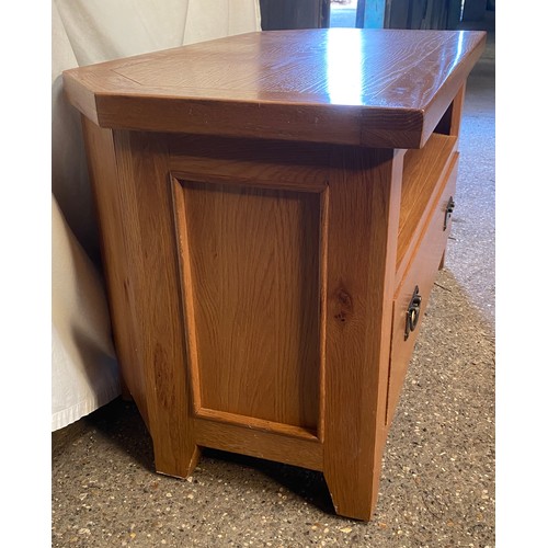 82 - Oak TV stand with shelf and one long drawer. 57 h x102 w x 51cm d.