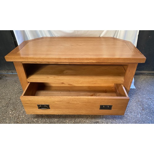 82 - Oak TV stand with shelf and one long drawer. 57 h x102 w x 51cm d.