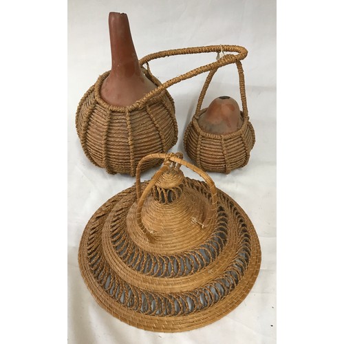 918 - African interest - Collection of African gourds and ceramic water carrier 30c h, basket ware etc.