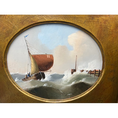 1164 - E.K. Redmore , a pair of oval seascapes, oil on board. Sight size 20 x 24cm.