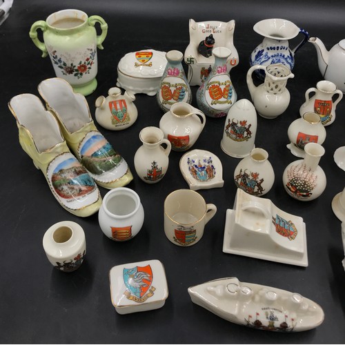 109 - Crested ware to include Arcadian model of a tank and torpedo boat destroyer:Southampton, Lighthouse:... 